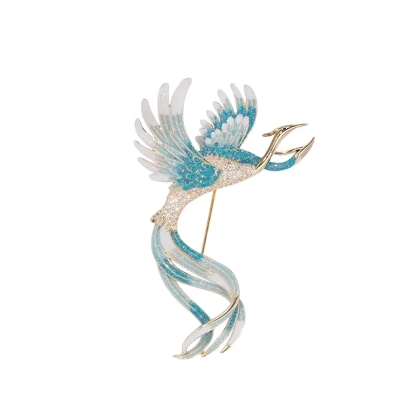blue enamel bird brooch isolated on white