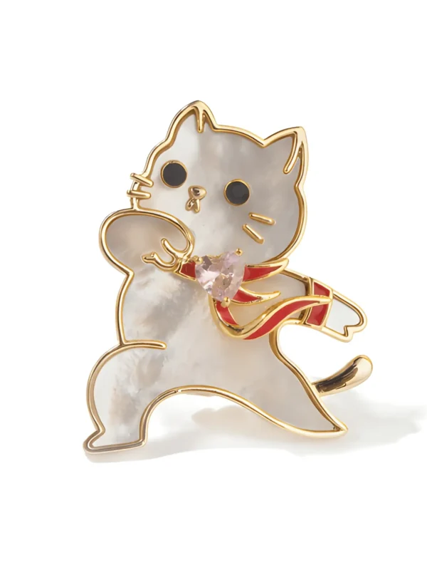 Cute dancing cat brooch with a pink stone and red scarf
