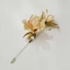 Silk Blossom Brooch Angle View Angled view of gold-trimmed silk blossom brooch